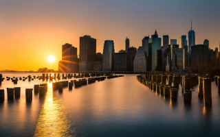 Sunset cityscape river bridge skyscraper - a few building free wallpaper