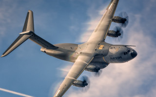 Large airplane blue sky clouds - anamorphic free wallpaper