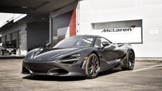 Black sports car parking lot 21 - a parking lot next free wallpaper