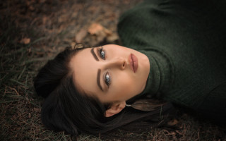Woman lying outdoors blurry blueeyes - free forest wallpaper