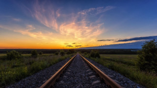 Train track sunset clouds grass - a grassy area in the foreground free wallpaper
