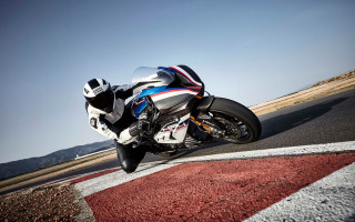 Motorcycle rider hill road sky - a person riding free wallpaper