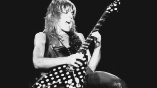 Woman polka dot dress playing - metal free wallpaper