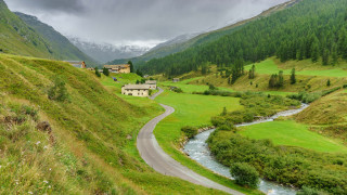 Winding road valley house stream - a stream running free wallpaper