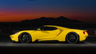 Yellow sports car night mountain - side profile free wallpaper