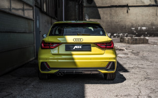 Yellow car garage building open - rim free wallpaper