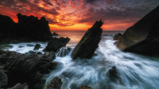 Sunset rocky beach waves red - a red sky above free wallpaper