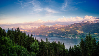 Lake mountains trees sky clouds 23 - a scenic view of a lake free wallpaper