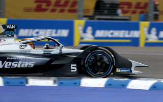 Racecar driving blurry background ue5 - a race car free wallpaper