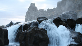 Waterfall rocks ocean sky clouds - rock free wallpaper