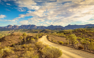 Desert mountains dirt road cinematic - albert namatjira free wallpaper