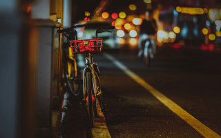 Bicycle street night city lights - a bicycle free wallpaper
