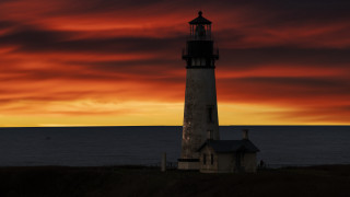 Lighthouse hill sunset clouds red - atmospheric lighting free wallpaper