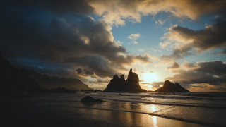 Sunset beach rock formation clouds - a sunset view of a beach free wallpaper