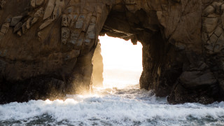 Rock formation light center water - the shore free wallpaper