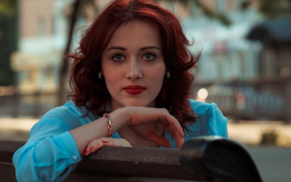 Red haired woman portrait blue 4 - a bench free wallpaper
