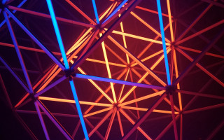 Geometric abstract sculpture red blue - a blue light in the middle free wallpaper