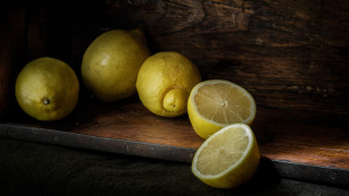 Lemons wooden table knife lemon - a still life free wallpaper