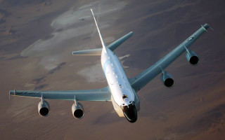 Jetliner flying cloudy sky desert - space art free wallpaper