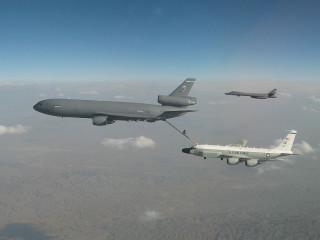 Military plane towing another plane - a military plane free wallpaper