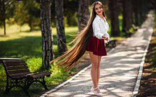 Woman long hair park bench - flowing hair free wallpaper