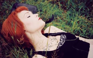 Gothic redhair laying in grass - gothic art free wallpaper for desktop
