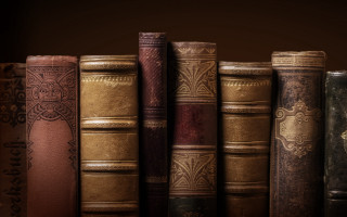 Old books row shelf clock - a table top free wallpaper