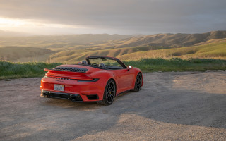 Red sports car mountains sunshine - 8k artistic photography free wallpaper