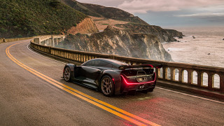 Black sports car ocean cliff - a cliff in the background free wallpaper
