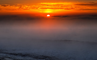 Sunset foggy ocean boat matte - mist free wallpaper