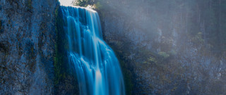 Waterfall blue trees night sky - side and trees free wallpaper