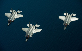 Fighter jets over land water - two fighter jet free wallpaper
