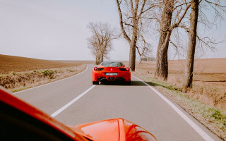 Red sports car autumn nature 2 - a road next free wallpaper