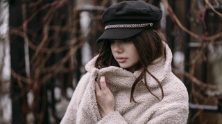 Woman coat hat snow blurry - soft free wallpaper