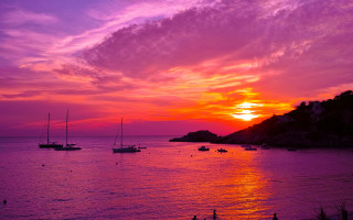 Sunset boats hill beach people - colorful cloud free wallpaper