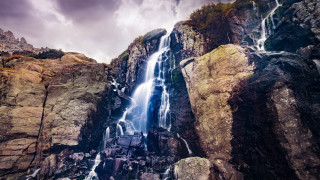 Waterfall mountain rocks cloudy sky - rock and boulders free wallpaper
