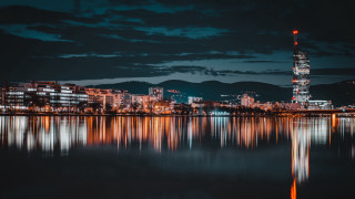 City skyline lake bridge night - a reflection of the city free wallpaper