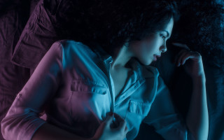 Woman bed relaxing blackhair jacket - her chin free wallpaper