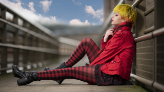 Yellow haired gothic painting sitting - a ledge free wallpaper