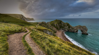 Beach path large rock formation - a path free wallpaper
