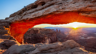 Large arch sunset beach mountain - a sun free wallpaper