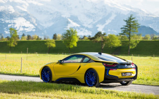 Yellow sports car mountain landscape - vivid free wallpaper