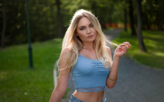 Woman blue top walking park - eszter mattioni free wallpaper