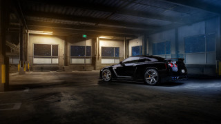 Black sports car parking garage 8 - a parking garage free wallpaper