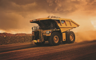 Dump truck dirt road cloudy - a dirt road free wallpaper