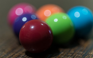 Colorful balls on wooden table - colorful ball free wallpaper
