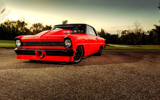 Red car forest road sunset - a gravel road next free wallpaper