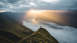 Mountain view clouds sunlight lensflare - the cloud free wallpaper