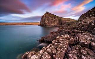 Rocky cliff water mountain cloudy 2 - a rocky cliff free wallpaper