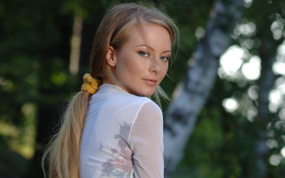 Woman ponytail flower white shirt - a yellow flower free wallpaper